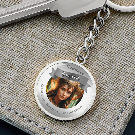 Goddess Brigid Charm Keychain - This Luxury Charm Keychain is more than just a keyring — it’s an empowering expression of your dreams, intentions, and personal energy.Featuring an original design with meaningful affirmations, symbols, or imagery, each cha