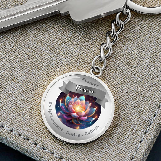 Lotus - Charm Keychain - This Luxury Charm Keychain is more than just a keyring — it’s an empowering expression of your dreams, intentions, and personal energy.Featuring an original design with meaningful affirmations, symbols, or imagery, each charm is t