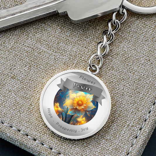 Narcissus - Charm Keychain - This Luxury Charm Keychain is more than just a keyring — it’s an empowering expression of your dreams, intentions, and personal energy.Featuring an original design with meaningful affirmations, symbols, or imagery, each charm