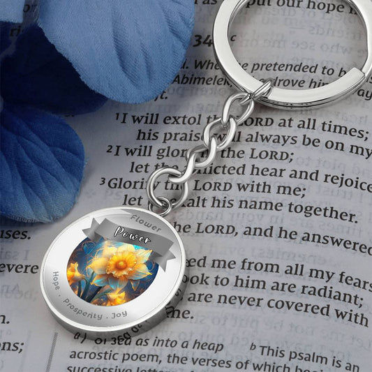 Narcissus - Charm Keychain - This Luxury Charm Keychain is more than just a keyring — it’s an empowering expression of your dreams, intentions, and personal energy.Featuring an original design with meaningful affirmations, symbols, or imagery, each charm