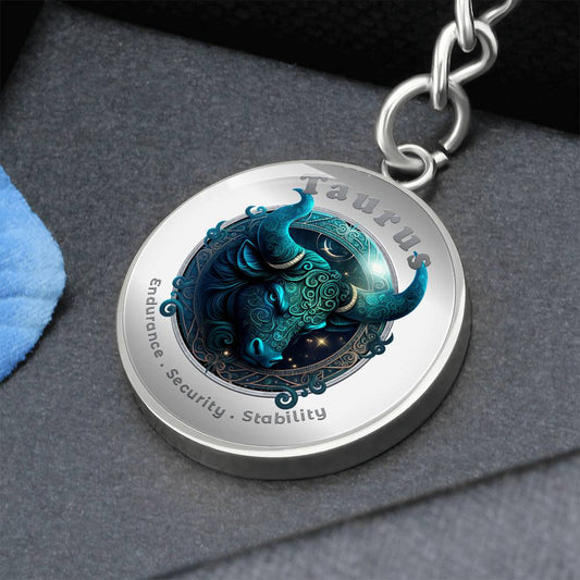 Taurus - Charm Keychain - This Luxury Charm Keychain is more than just a keyring — it’s an empowering expression of your dreams, intentions, and personal energy.Featuring an original design with meaningful affirmations, symbols, or imagery, each charm is