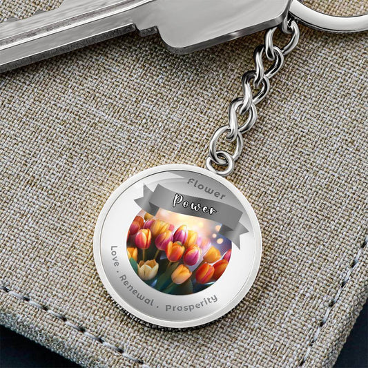Tulip - Charm Keychain - This Luxury Charm Keychain is more than just a keyring — it’s an empowering expression of your dreams, intentions, and personal energy.Featuring an original design with meaningful affirmations, symbols, or imagery, each charm is t