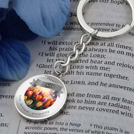 Tulip - Charm Keychain - This Luxury Charm Keychain is more than just a keyring — it’s an empowering expression of your dreams, intentions, and personal energy.Featuring an original design with meaningful affirmations, symbols, or imagery, each charm is t