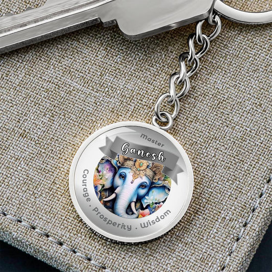 Ganesh Charm Keychain - Courage, Prosperity & Wisdom - This Luxury Charm Keychain is more than just a keyring — it’s an empowering expression of your dreams, intentions, and personal energy.Featuring an original design with meaningful affirmations, symbol