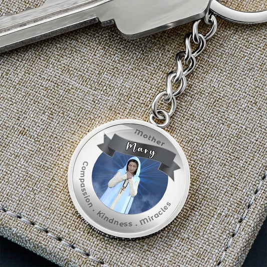 Mother Mary - Charm Keychain For Compassion, Kindness & Miracles - This Luxury Charm Keychain is more than just a keyring — it’s an empowering expression of your dreams, intentions, and personal energy.Featuring an original design with meaningful affirmat