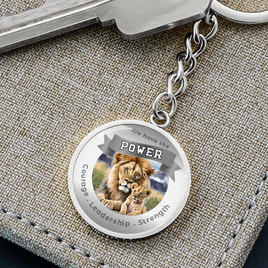 Lion & Cub - Power Animal Charm Keychain - This Luxury Charm Keychain is more than just a keyring — it’s an empowering expression of your dreams, intentions, and personal energy.Featuring an original design with meaningful affirmations, symbols, or imager