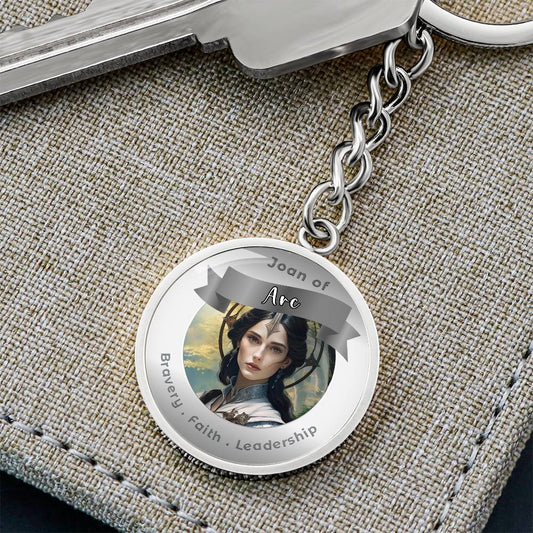 Joan of Arc - Charm Keychain - This Luxury Charm Keychain is more than just a keyring — it’s an empowering expression of your dreams, intentions, and personal energy.Featuring an original design with meaningful affirmations, symbols, or imagery, each char