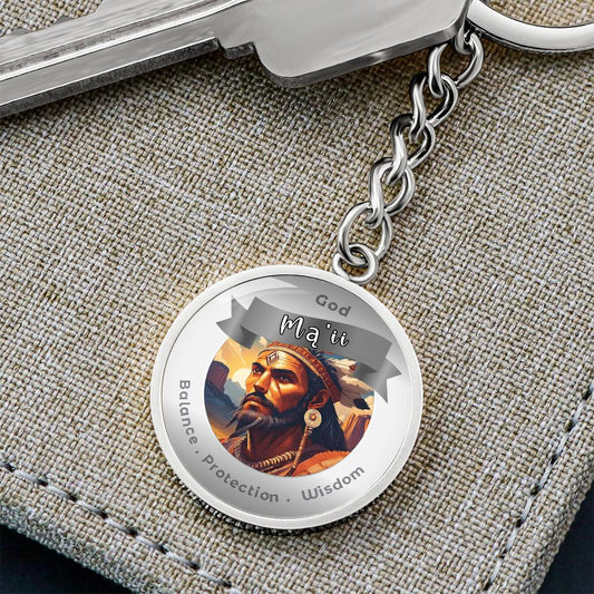 Mą’ii- Charm Keychain For Balance Protection Wisdom - This Luxury Charm Keychain is more than just a keyring — it’s an empowering expression of your dreams, intentions, and personal energy.Featuring an original design with meaningful affirmations, symbol