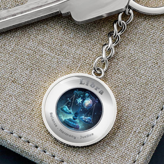 Libra - Charm Keychain - This Luxury Charm Keychain is more than just a keyring — it’s an empowering expression of your dreams, intentions, and personal energy.Featuring an original design with meaningful affirmations, symbols, or imagery, each charm is t