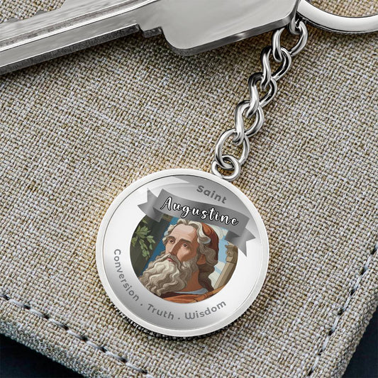 Saint Augustine - Charm Keychain - This Luxury Charm Keychain is more than just a keyring — it’s an empowering expression of your dreams, intentions, and personal energy.Featuring an original design with meaningful affirmations, symbols, or imagery, each