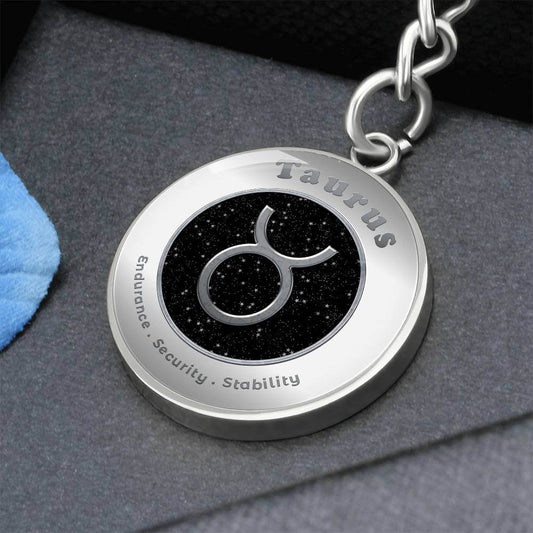Taurus - Charm Keychain - This Luxury Charm Keychain is more than just a keyring — it’s an empowering expression of your dreams, intentions, and personal energy.Featuring an original design with meaningful affirmations, symbols, or imagery, each charm is