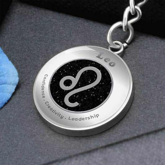Leo - Charm Keychain - This Luxury Charm Keychain is more than just a keyring — it’s an empowering expression of your dreams, intentions, and personal energy.Featuring an original design with meaningful affirmations, symbols, or imagery, each charm is tho