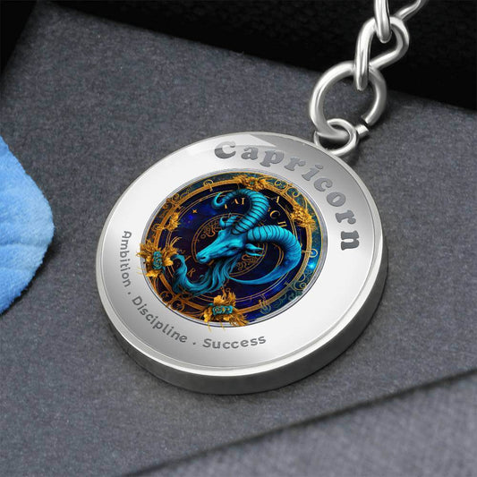 Capricorn - Charm Keychain - This Luxury Charm Keychain is more than just a keyring — it’s an empowering expression of your dreams, intentions, and personal energy.Featuring an original design with meaningful affirmations, symbols, or imagery, each charm