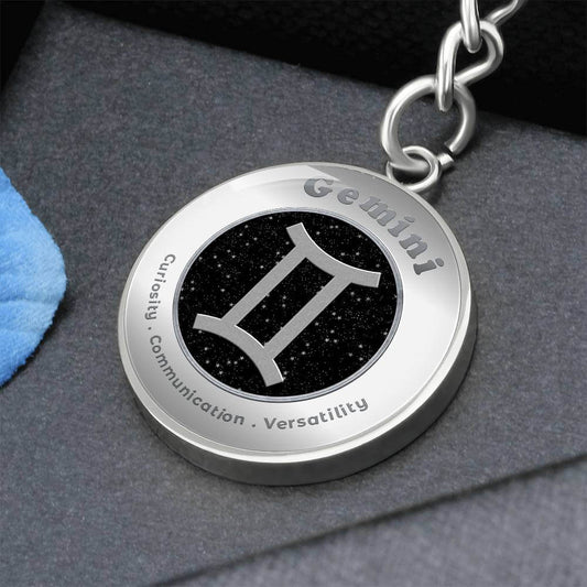 Gemini - Charm Keychain - This Luxury Charm Keychain is more than just a keyring — it’s an empowering expression of your dreams, intentions, and personal energy.Featuring an original design with meaningful affirmations, symbols, or imagery, each charm is