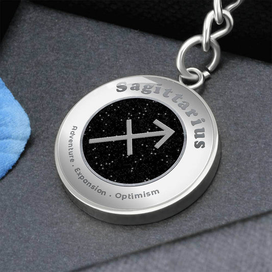 Sagittarius - Charm Keychain - This Luxury Charm Keychain is more than just a keyring — it’s an empowering expression of your dreams, intentions, and personal energy.Featuring an original design with meaningful affirmations, symbols, or imagery, each char