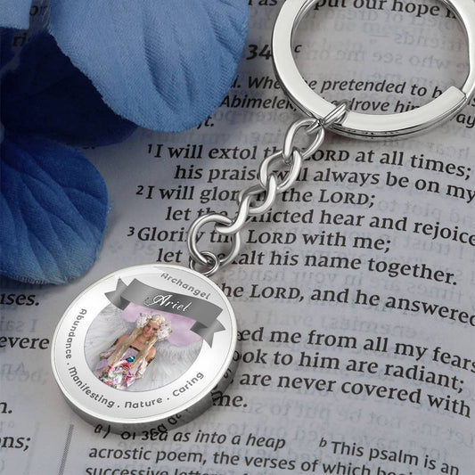Archangel Ariel- Charm Keychain - This Luxury Charm Keychain is more than just a keyring — it’s an empowering expression of your dreams, intentions, and personal energy.Featuring an original design with meaningful affirmations, symbols, or imagery, each c