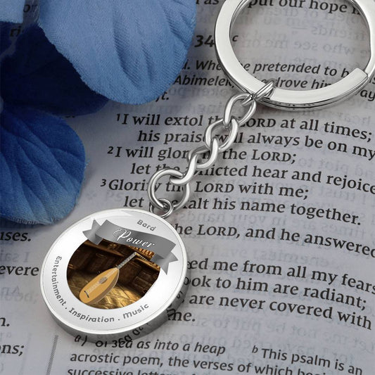 Bard 2 - RPG Fantasy Charm Keychain - This Luxury Charm Keychain is more than just a keyring — it’s an empowering expression of your dreams, intentions, and personal energy.Featuring an original design with meaningful affirmations, symbols, or imagery, ea
